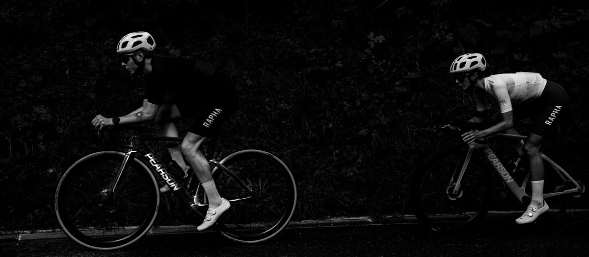 A rider on a Pearson Shift 2.0 against a graphic alpine hillside