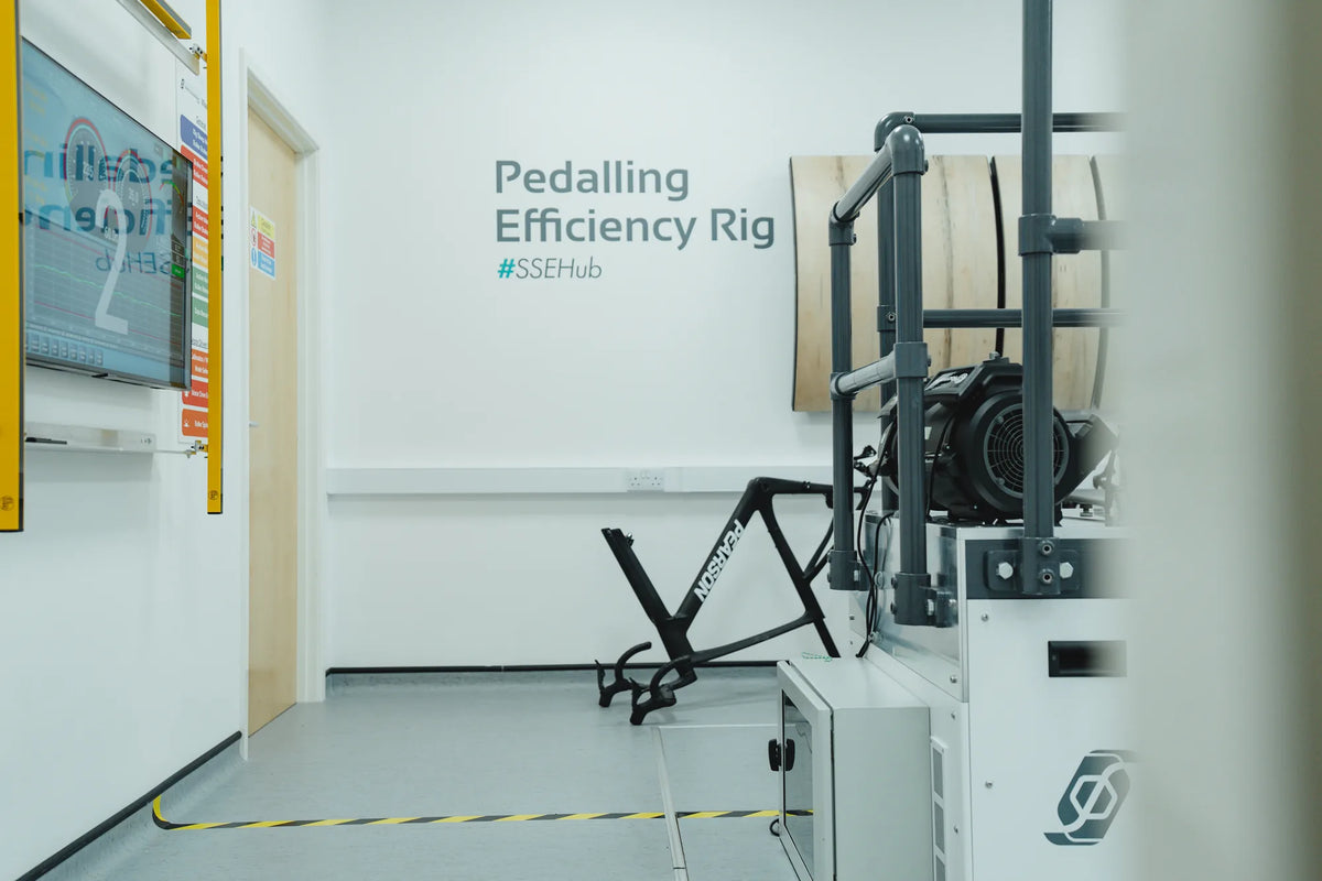 The pedalling efficiency rig at the Silverstone Sports Engineering Hub with a bike mounted on it
